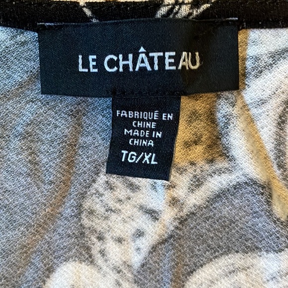 Le Chateau black and cream v neck dress. - Picture 3 of 7